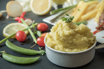 Mashed potatoes in blue bowl.