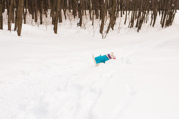 Dog Jack Russell Terrier playing in winter park