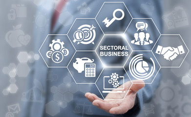 Sectoral Business concept. Man offers business sectoral (BSC) text icon on a virtual interface.