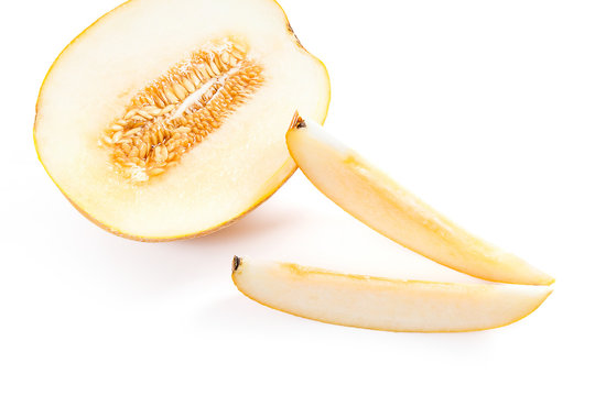 Sliced honeydew melon tropical fruit isolated on a white background.