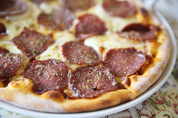 Pepperoni pizza , pizza with pepperoni mozzarella cheese and tomatoes with sauce background italian food