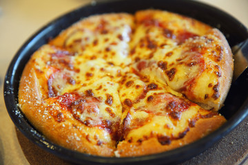 Pepperoni pizza , pizza with pepperoni mozzarella cheese and tomatoes with sauce background italian food