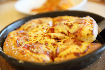 Pepperoni pizza , pizza with pepperoni mozzarella cheese and tomatoes with sauce background italian food