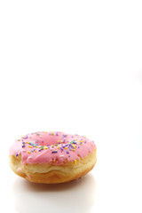Strawberry chocolate donut isolated in white background