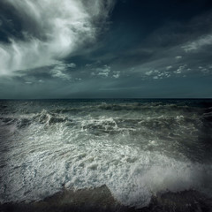 View of great storm on the sea. Strong wind and big waves with s