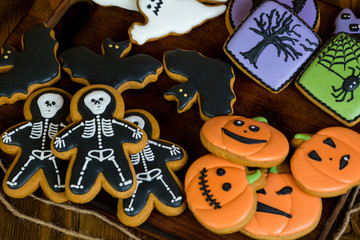 Fototapeta na wymiar Halloween homemade gingerbread cookies background