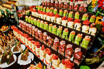 Huge variety of delicious and colorful meals on wedding banquet.