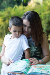 Mother and son reading a storybook