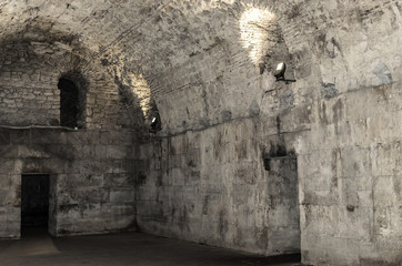 Old abandoned basement in the castle.