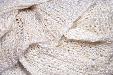 White knitting wool scarf folding