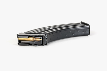 Metal magazine that carries. Empty cartridge for gun.