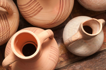 Amphoras, vases and old clay jugs in a rural house