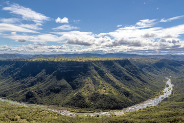 Unzimkulwana River Flowing Through Winter Vegatation Lined Valley