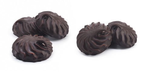 chocolate covered marshmallows, part of one bitten off, isolated on white background