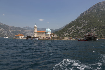 Fototapeta na wymiar Handicraft Island Our Lady of the Rocks in Boka Kotorska Bay. Montenegro.