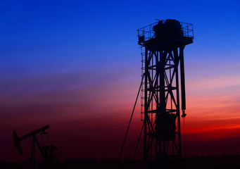 The pumping unit is working in the setting sun