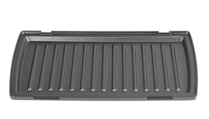 Open waffle iron on a white background with clipping path