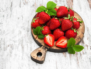 Fresh strawberries on a board