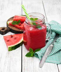 Jars with watermelon smoothie