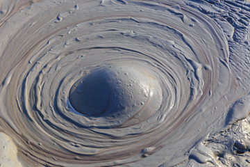 Fototapeta na wymiar Bubbles boiling mud in the volcanoes of Gobustan.Azerbaijan