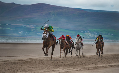 Horse racing on the beach