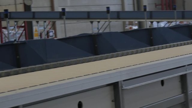 line of automatic distribution in logistics center. sorter