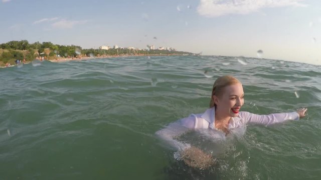 Business Woman Swim In The Sea