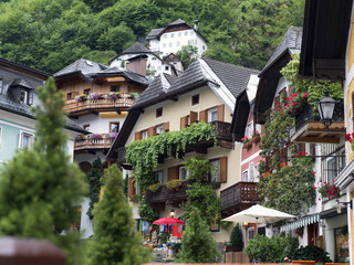 Town Hallstatt with mountain lake and salt mines. Alpine massif, beautiful canyon in Austria. Salzburg Alpine valley in summer, clear water. Destination for vacation, hiking and relaxation.