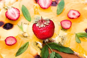 Fruit pizza with strawberries kiwi pineapple