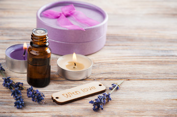 Fototapeta na wymiar SPA composition with essential oil, lavender flowers