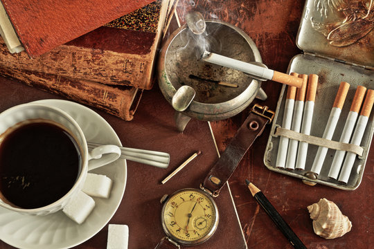 Composition with a Cup of coffee and Antiques