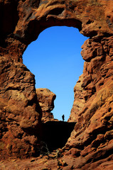 Arch in Canyon Rock Formations Silhouetter of Hiker