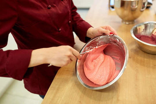 Chef Making Macaron Batter At Confectionery