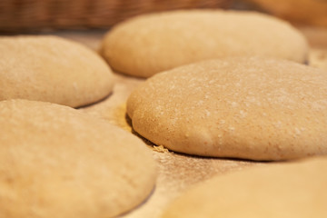 Fototapeta na wymiar close up of yeast bread dough at bakery