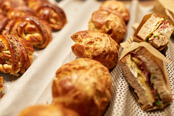 close up of bread, buns, pies and sandwiches