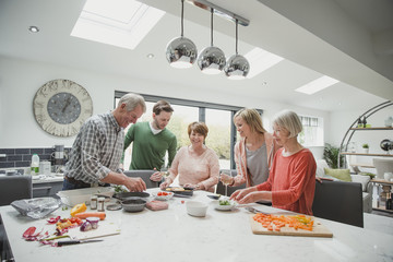 Family Cooking A Meal Together