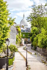 Foto op Plexiglas Cityscape view on the beautiful street with Sacred Heart cathedral on Monmartre hill in Paris © rh2010