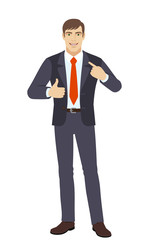 Self promotion. Businessman pointing the finger at himself and showing thumb up