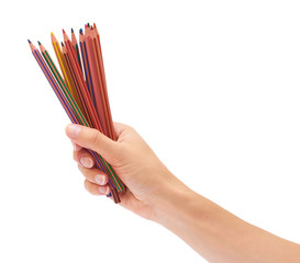 color pencils in hand isolated on white background