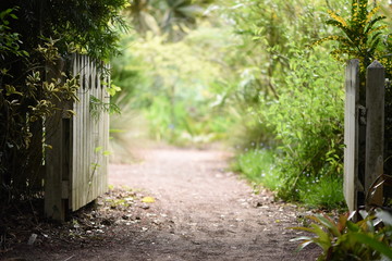 opened gates that lead to a garden