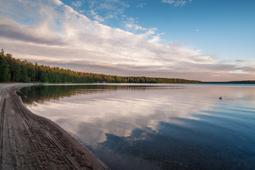 Sunset on beach with mood light At summer evening in Nurmijärvi, Finland