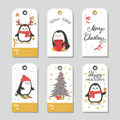 Christmas gift tags with cute cartoon penguins. Vector illustration.