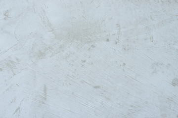 Wall fragment with scratches and cracks