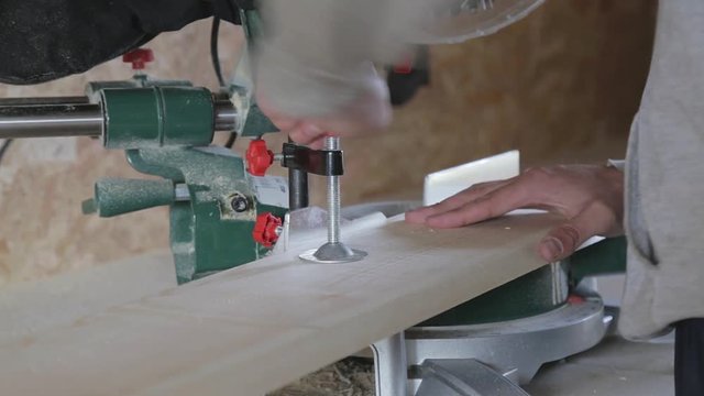 Processing of wood in workshop