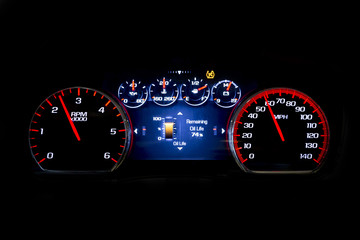 Modern light car mileage on black background Oil life