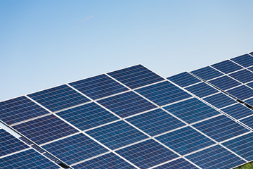 Obraz premium Solar panels against blue sky background