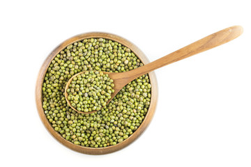 mung bean in wooden bowl isolated on white background ,top view