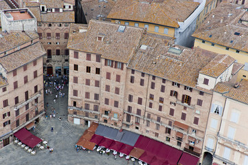 View of the square del campo from the bell tower of Mangia in Siena, Tuscany disctrict. Italy.