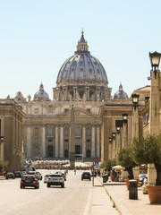 Rome - Circa June 2015: People and cars on Via della Conciliazione - St. Peter's Basilica in the background