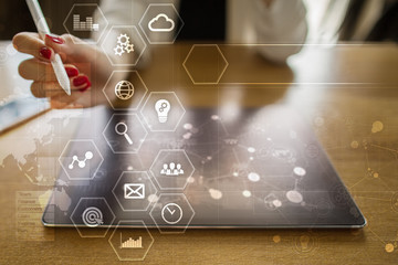 Business and technology concept. Graphs and icons on virtual screen.